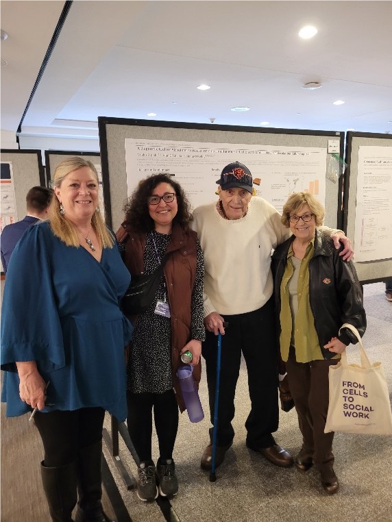 Dr Vuslat Juska with attendees who are diagnosed with Alzheimer’s disease and their families and carers.