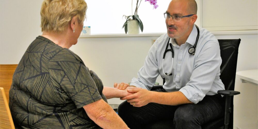 A doctor examining a patient