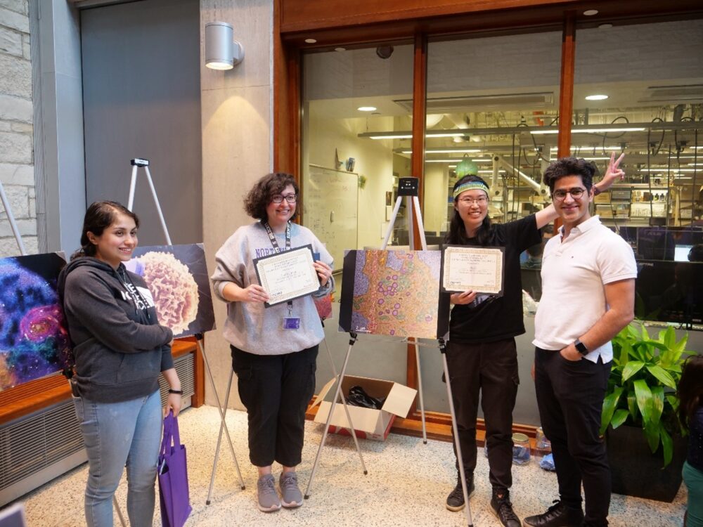 Vuslat with the Kelley Lab group members at the award ceremony at Northwestern University, NUANCE.
